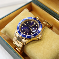 Authentic Rolex Submariner 18kt gold, Tropical Dial, 40mm, 16618