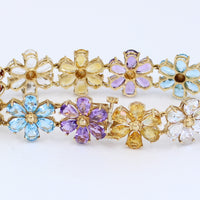 PULSERA DE FLORES CON PIEDRAS PRECIOSAS 14KT