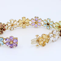 PULSERA DE FLORES CON PIEDRAS PRECIOSAS 14KT