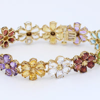 PULSERA DE FLORES CON PIEDRAS PRECIOSAS 14KT