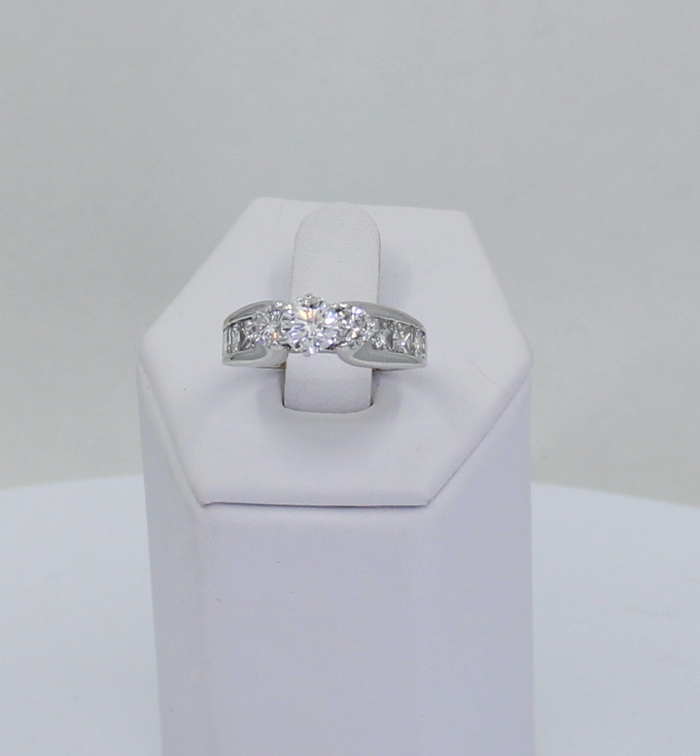 Three Stone & Princess Ring